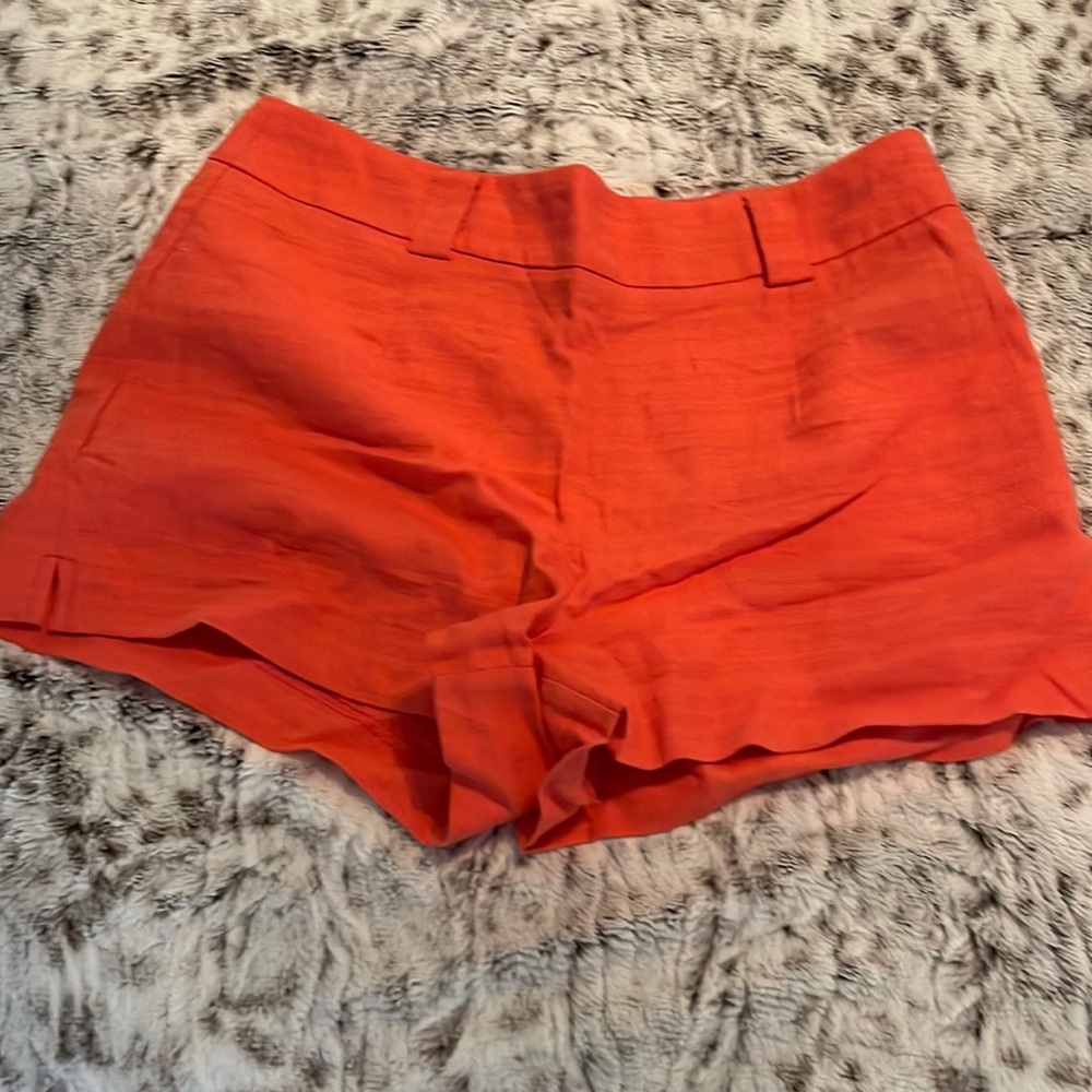 Orange shorts for tucking shirt in w belt